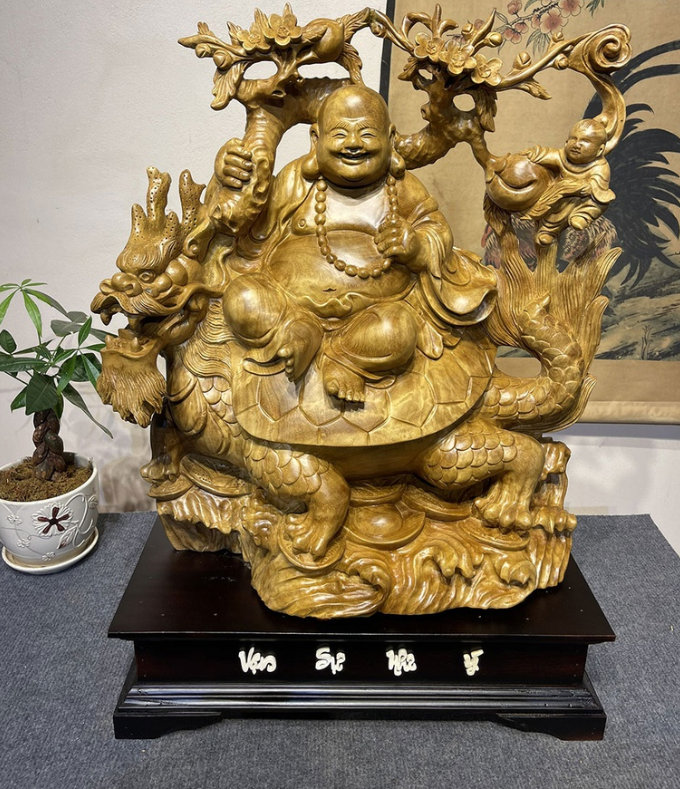 Tượng gỗ Di Lặc Cưỡi Long Quy Gỗ Xá Xị.png